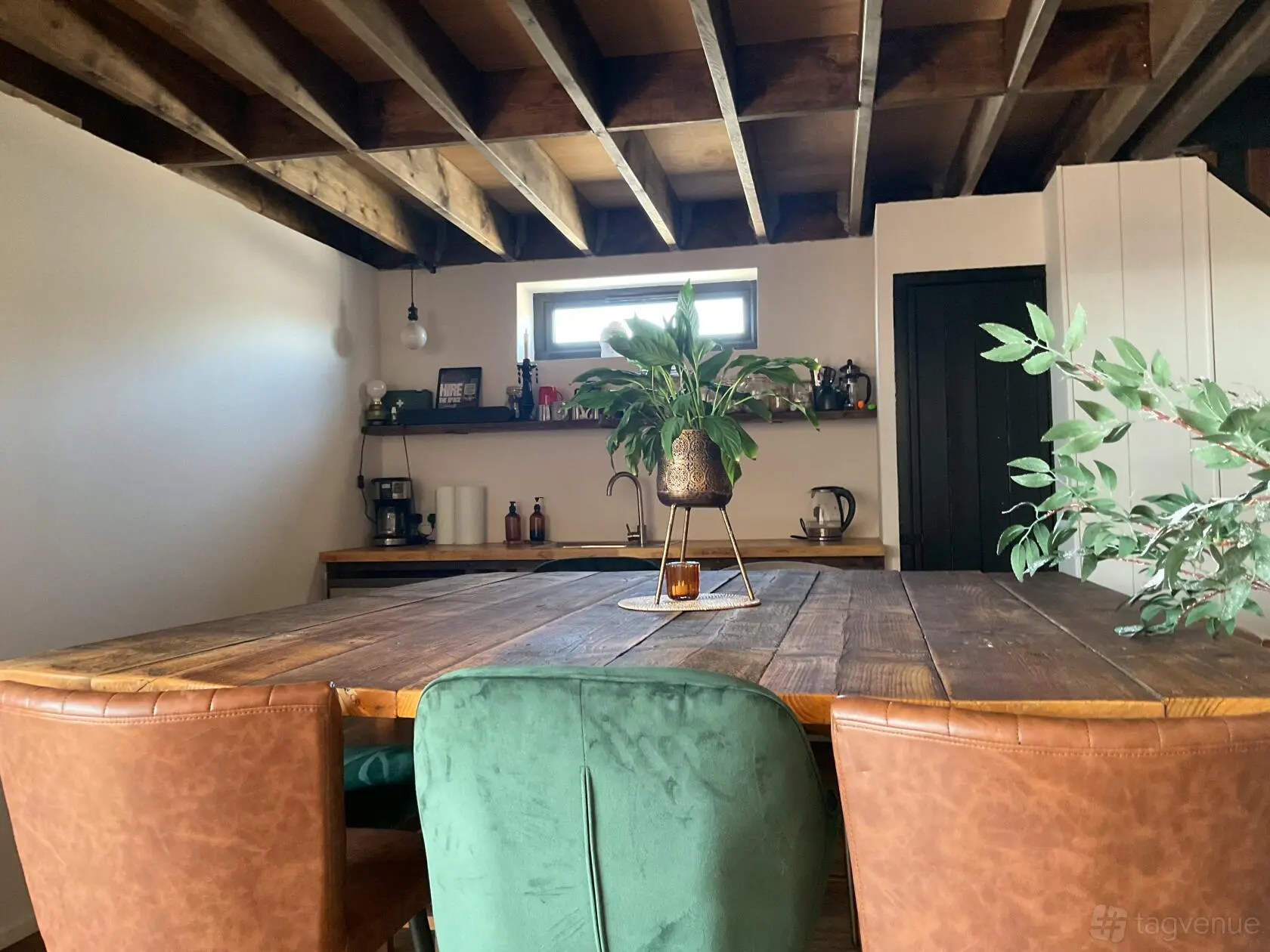 Close view across the long wooden table